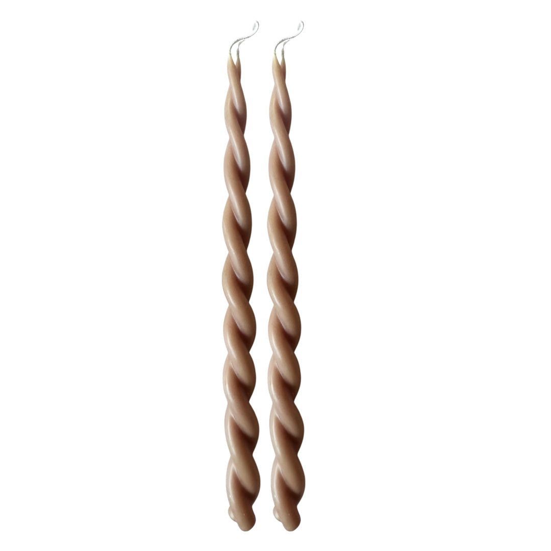 GLŌAM 12" hand-dipped twisted beeswax taper candles in Tofino — a soft sand beige, made in Santa Barbara with natural plant-based pigments.