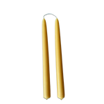 Hand-dipped beeswax taper candles in natural yellow hue no drip, crafted for a luxurious look.