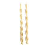 A pair of twisted pure beeswax taper candles plant-based pigments in yellow butter color, hand crafted for a luxurious look