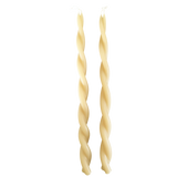 A pair of twisted pure beeswax taper candles plant-based pigments in yellow butter color, hand crafted for a luxurious look
