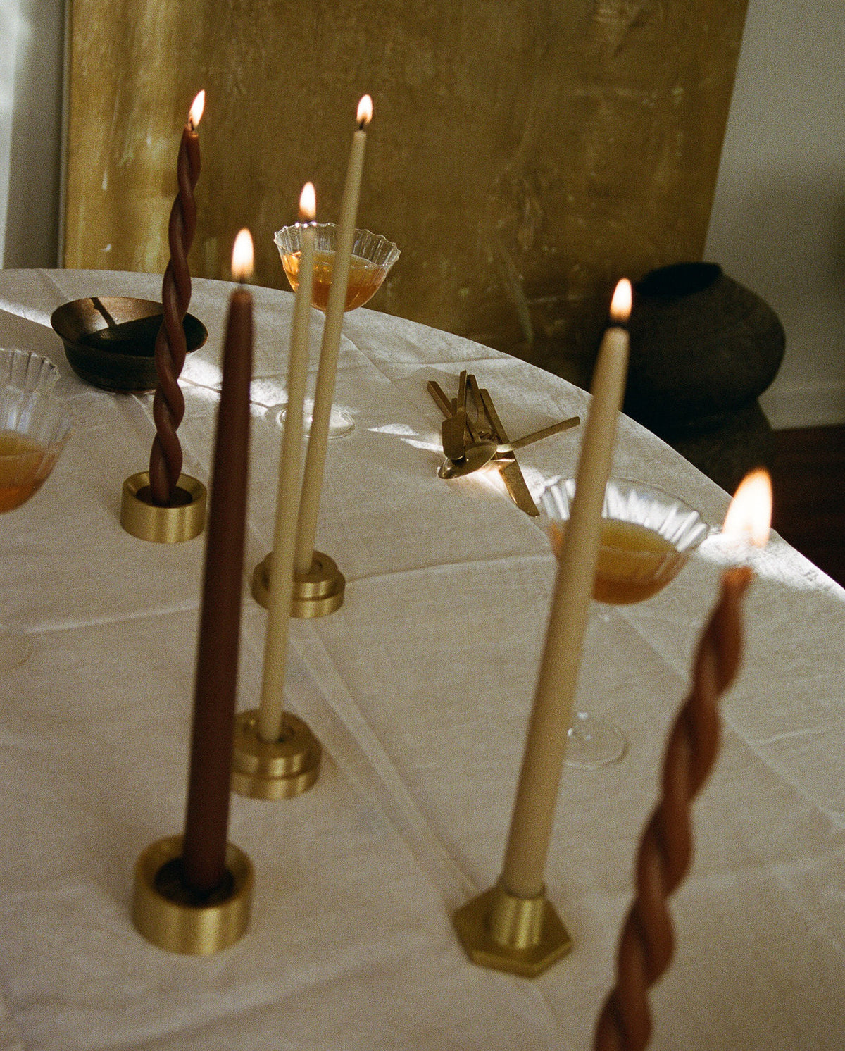GLŌAM spike golden brass candlesticks layering with spike holder, a versatile taper candle holder that fits Classic, Twisted, and stubby candles, solid polished brass.