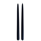 GLŌAM 12" hand-dipped beeswax taper candles in Noir — pure black, made in Santa Barbara with natural plant-based pigments.