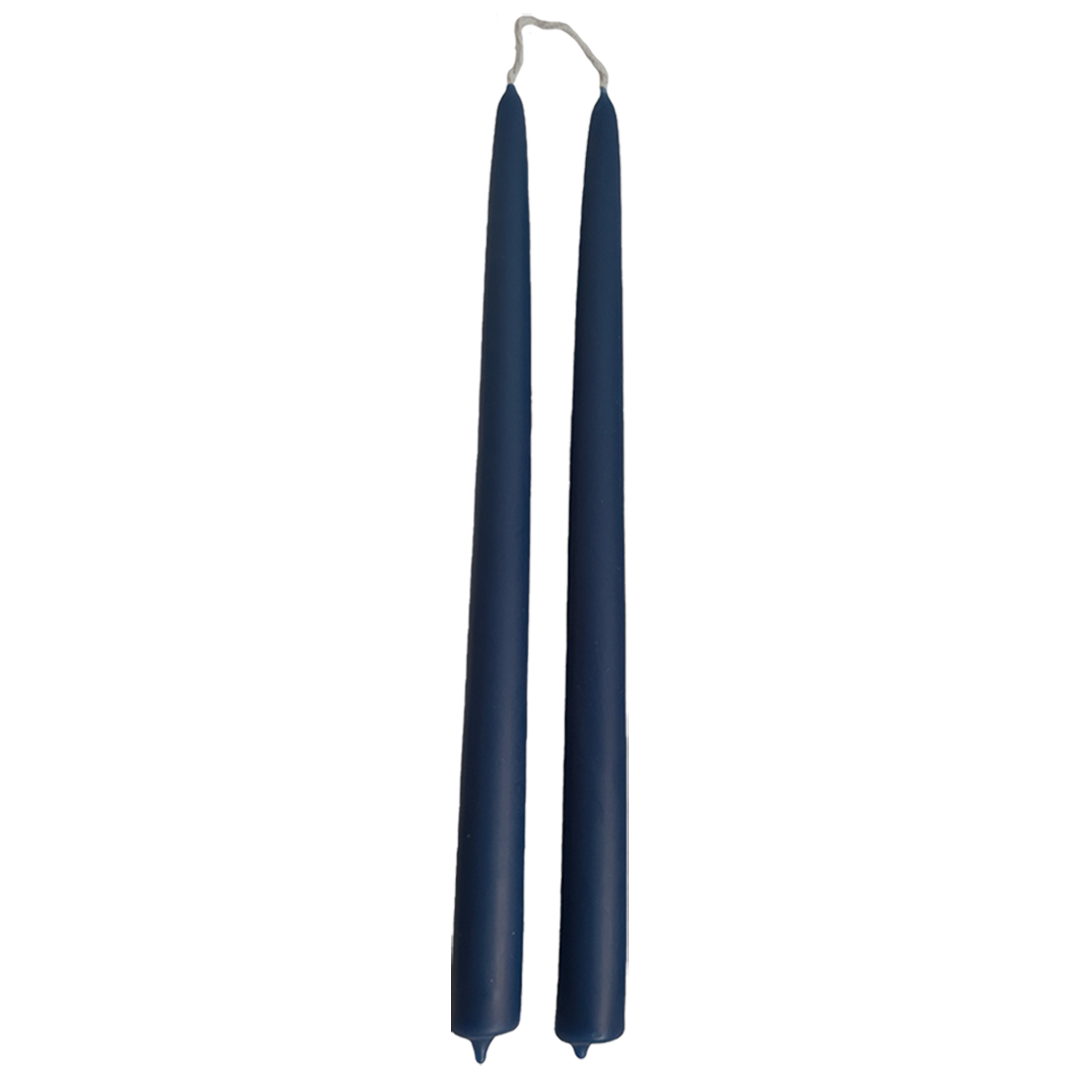 GLŌAM 12" hand-dipped beeswax taper candles in Oxford Blue — a deep dark blue, made in Santa Barbara with natural plant-based pigments.