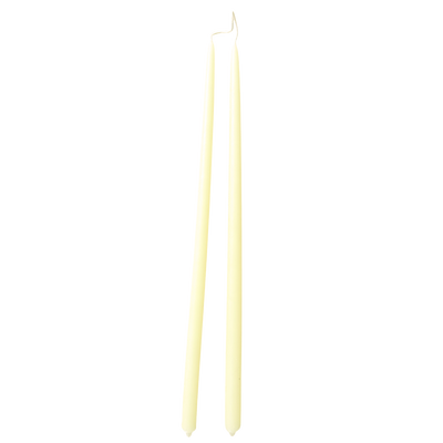 GLŌAM 12" hand-dipped thin beeswax taper candles in Beurre — a pale butter yellow, made in Santa Barbara with natural plant-based pigments.