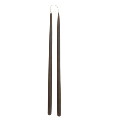 GLŌAM 12" hand-dipped thin beeswax taper candles in Carob — a warm earthy brown, made in Santa Barbara with natural plant-based pigments.