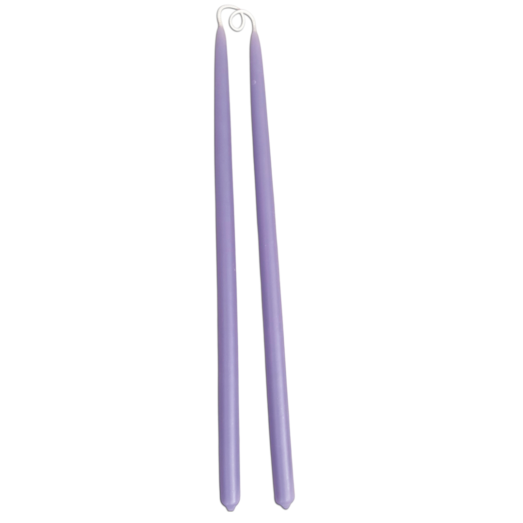 GLŌAM 12" hand-dipped thin beeswax taper candles in Lavender — a soft purple, made in Santa Barbara with natural plant-based pigments.
