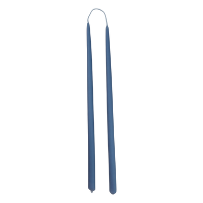 GLŌAM 12" hand-dipped thin beeswax taper candles in M Denim — a soft washed denim blue, made in Santa Barbara with natural plant-based pigments