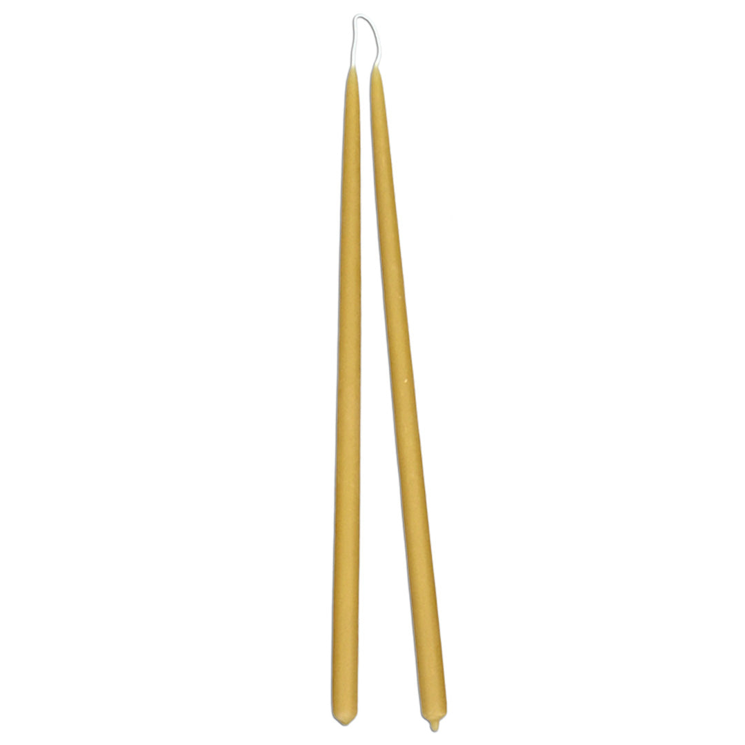 A pair of GLŌAM thin hand dipped, long beeswax taper candles, burn approximately 6 hours, no drip, in natural beeswax color