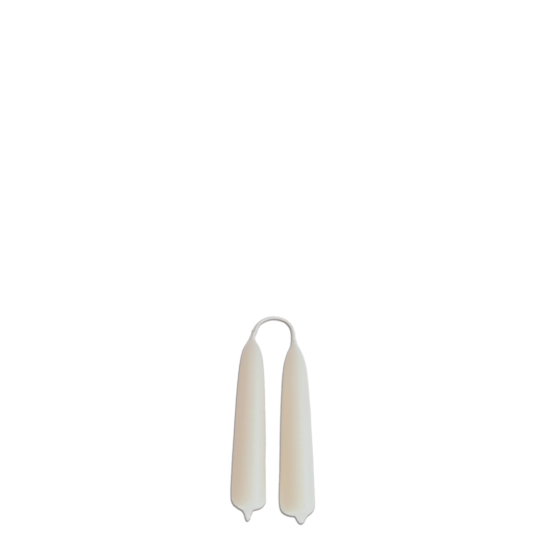GLŌAM 5" hand-dipped mini beeswax taper candles in Bird's Milk — a warm milky cream, made in Santa Barbara with natural plant-based pigments.