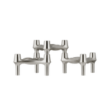 BMF candle holder is among the most iconic candle holder designs, made from  brushed chrome, holds skinny tapers