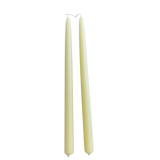 A pair of creamy-light-yellow color, in Beurre, hand-dipped beeswax taper candles made with natural plant-based pigments for an eco-friendly, non -drip, elegant home decor accent.