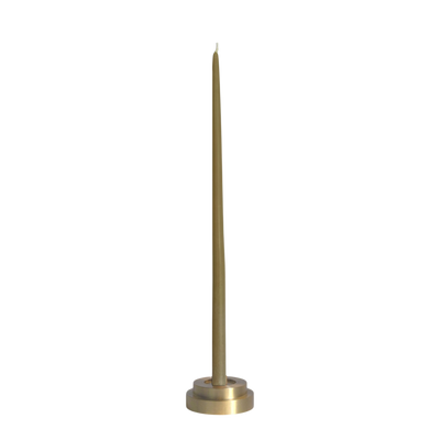 A high quality solid brass modern holder for skinny taper candle