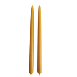 A pair of pure beeswax classic taper candles, hand dipped, no drip, in natural beeswax color, yellow hue