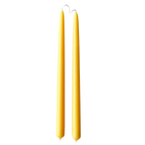 A pair of pure beeswax classic taper candles, hand dipped, no drip, in Natural beeswax color, yellow hue