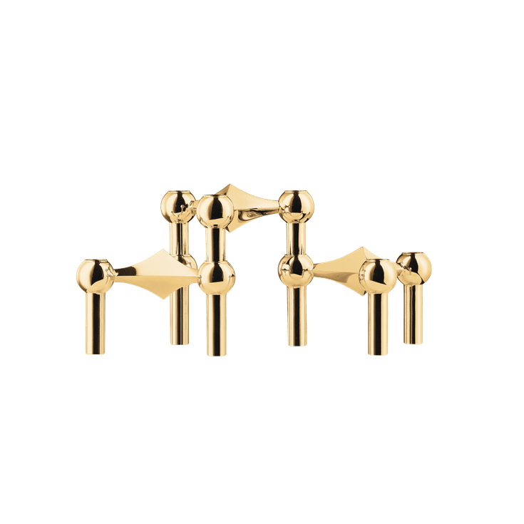 Cast in solid brass, it brings a warm, golden glow and a sense of enduring craftsmanship to any setting.
