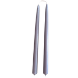 a pair of pure  beeswax taper candles hand dipped in lavender purple