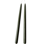 a pair of pure beeswax taper candles hand dipped in Dark Pine