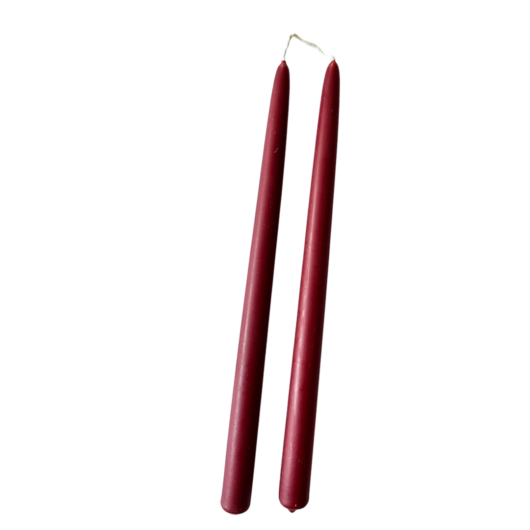 a pair of 12" Beeswax Taper candles in Vin Chaud, burgundy colour, dripless