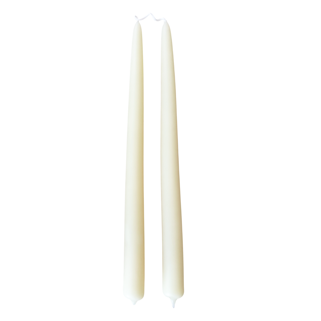 A pair of cream-white color, hand-dipped beeswax taper candles made with natural plant-based pigments for an eco-friendly, non -drip, elegant home decor accent.