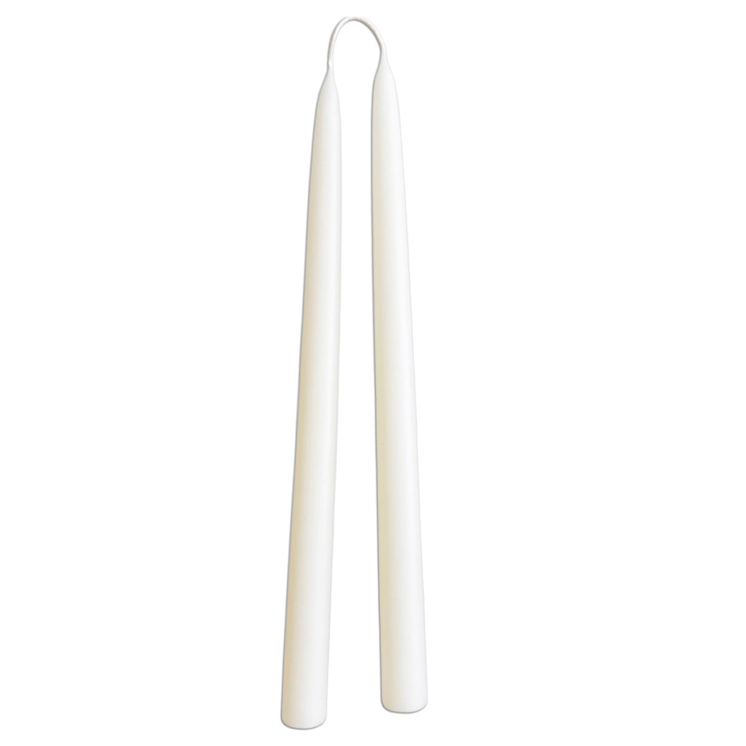 A pair of hand-dipped beeswax taper candles in Alpine Glow, White hue, by GLŌAM. Made with natural plant-based pigments for an eco-friendly, non drip, elegant home accent
