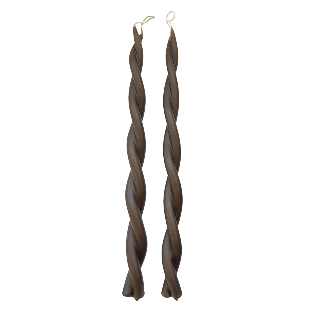 GLŌAM 12" hand-twisted beeswax taper candles in Carob — a warm earthy brown, made in Santa Barbara with natural plant-based pigments