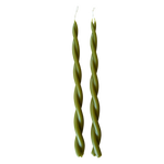 A pair of GLŌAM hand-twisted beeswax candles in Martini, crafted with plant-based pigments.
