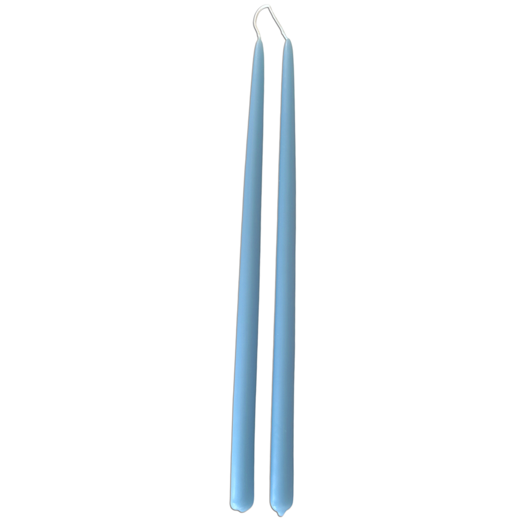 A pair of Fjord Blue,  hand-dipped beeswax taper candles made with natural plant-based pigments for an eco-friendly, non -drip, unique home decor accent.