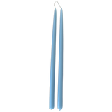 A pair of Fjord Blue,  hand-dipped beeswax taper candles made with natural plant-based pigments for an eco-friendly, non -drip, unique home decor accent.