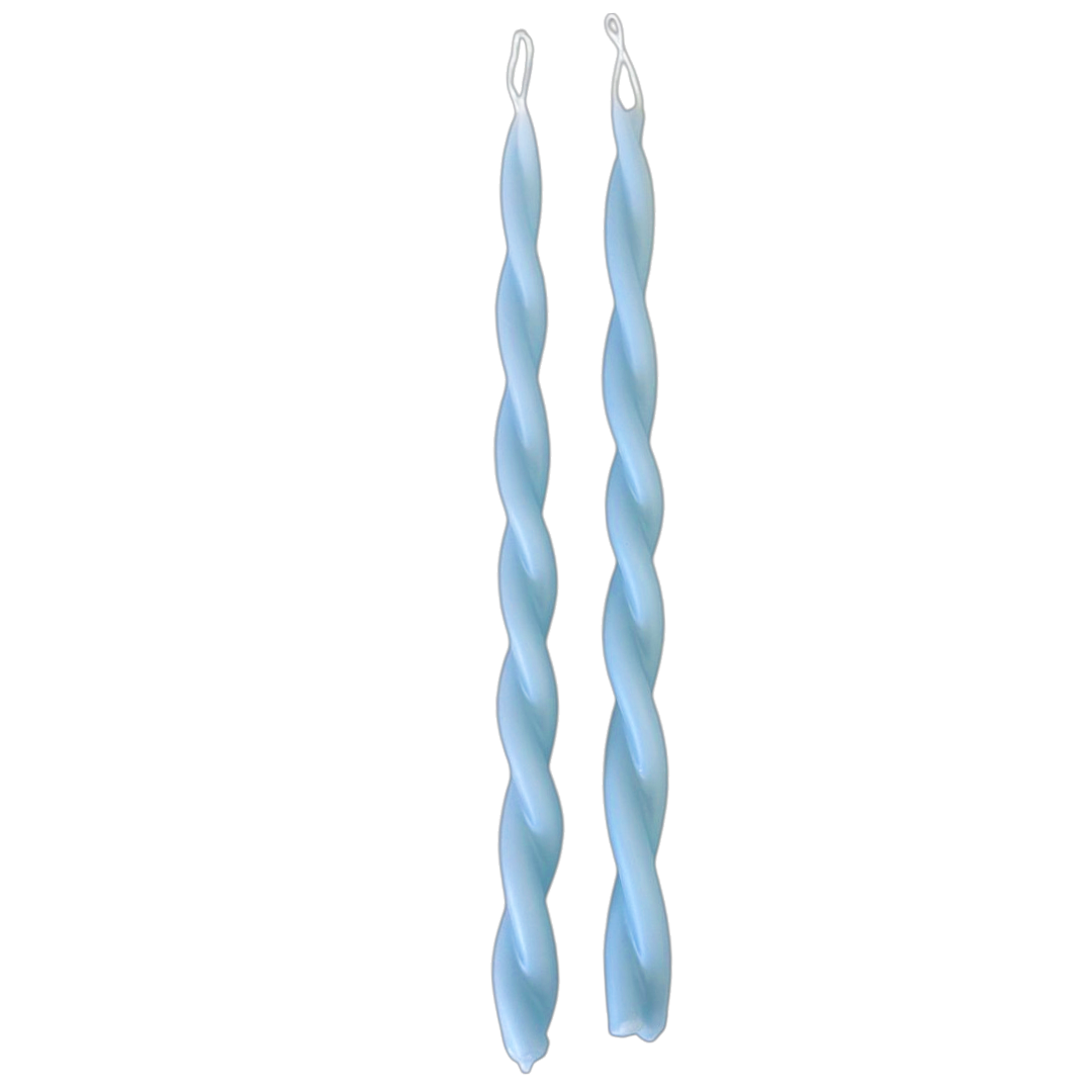 A pair of GLŌAM hand-twisted beeswax candles in Fjord Blue, crafted with plant-based pigments