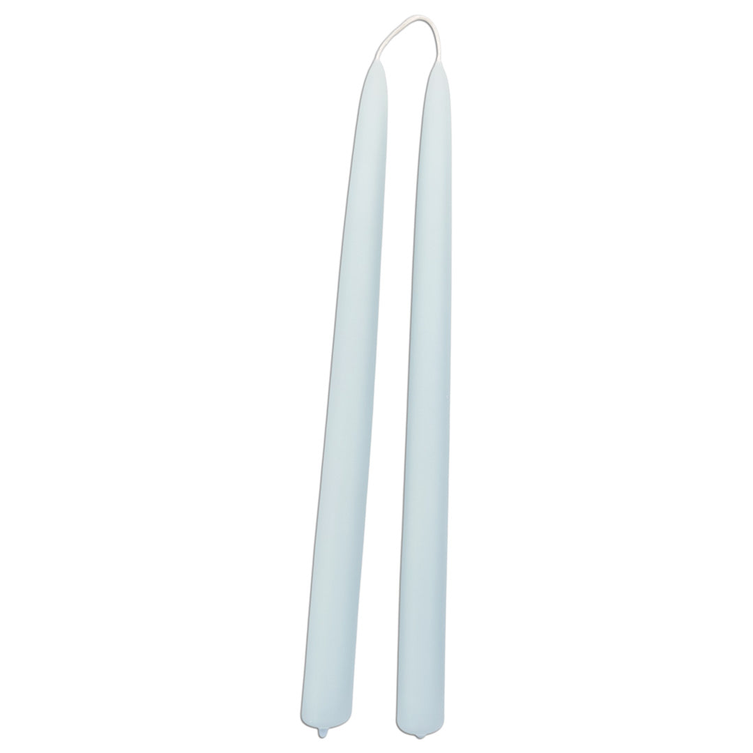 GLŌAM 12" hand-dipped beeswax taper candles in Azure — a clear light blue, made in Santa Barbara with natural plant-based pigments