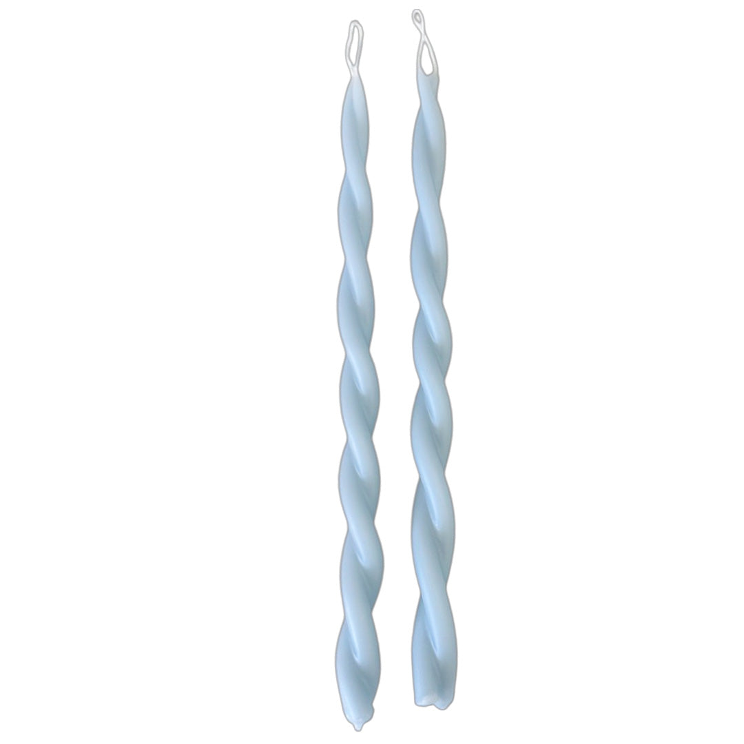 A pair of GLŌAM hand-twisted beeswax candles in Fjord Blue,a grey-blue hue crafted with plant-based pigments.