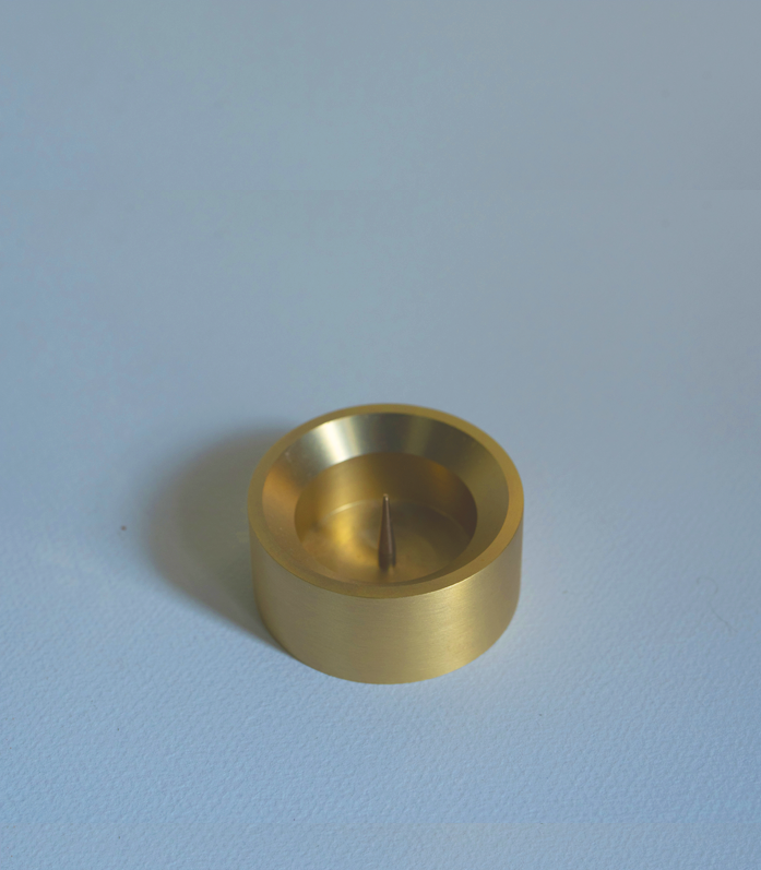 Designed by GLŌAM this holder fit our all types of Candles. Made from solid brass, it has a paperweight-like feel. 