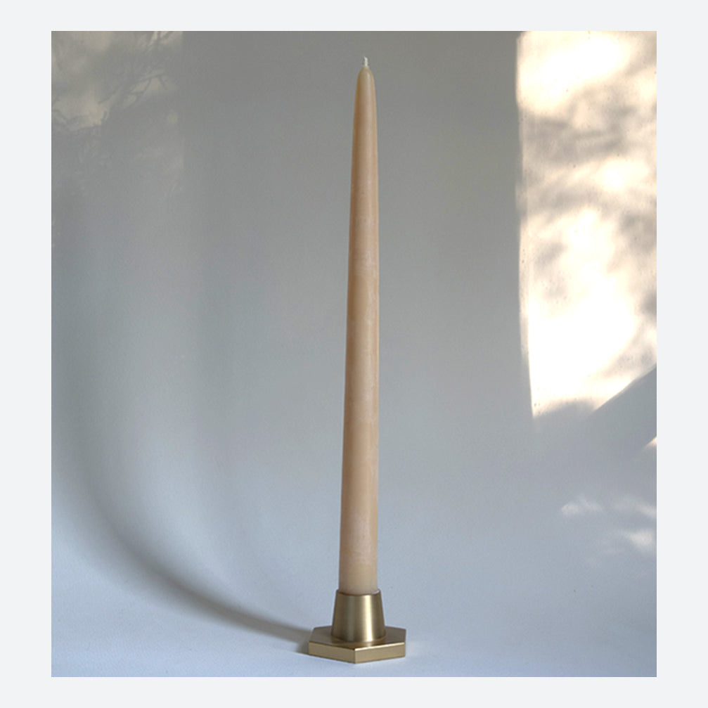 candle holder in solid brass in for classic taper candles  and twisted tapers designed by GLŌAM