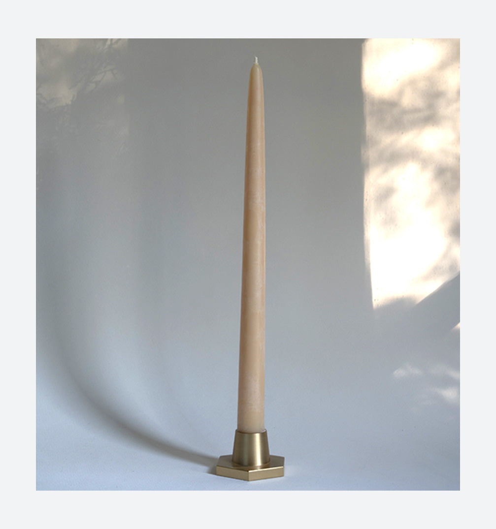 candle holder in solid brass in for classic taper candles  and twisted tapers designed by GLŌAM