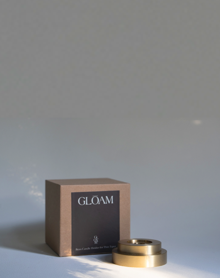 Designed  by GLŌAM this holder fit our Skinny Tapered Candles. Made from solid brass, it has a paperweight-like feel. 