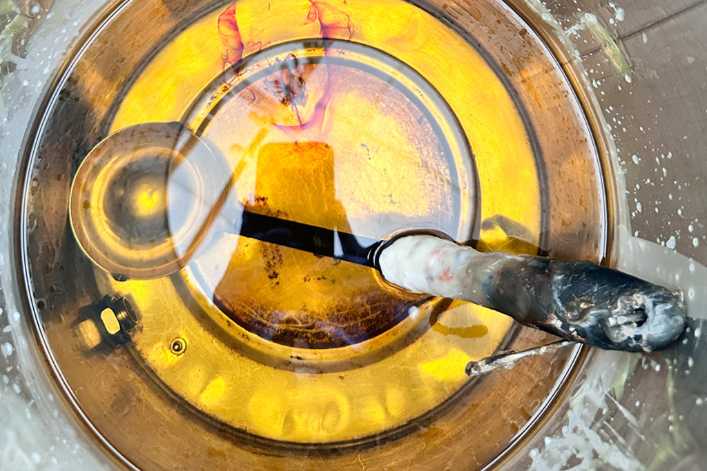 Molten 100% North American beeswax in a studio melter, GLŌAM Santa Barbara California