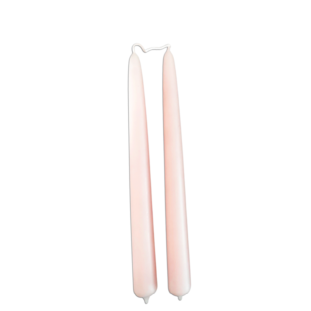 hand-dipped beeswax taper candles in Cashmere, dusty pink hue, made with natural plant-based pigments for an eco-friendly, elegant home decor accent. 