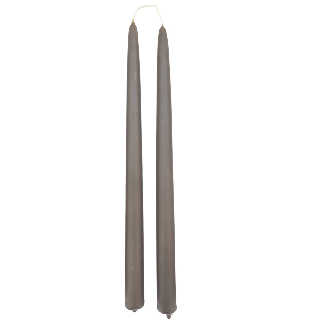 A pair of chocolate brown color, in Carob, hand-dipped beeswax taper candles made with natural plant-based pigments for an eco-friendly, non -drip, elegant home decor accent.
