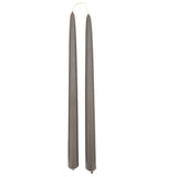 A pair of chocolate brown color, in Carob, hand-dipped beeswax taper candles made with natural plant-based pigments for an eco-friendly, non -drip, elegant home decor accent.