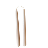 hand-dipped beeswax taper candles in marzipan hue, made with natural plant-based pigments for an eco-friendly, elegant home decor accent. 