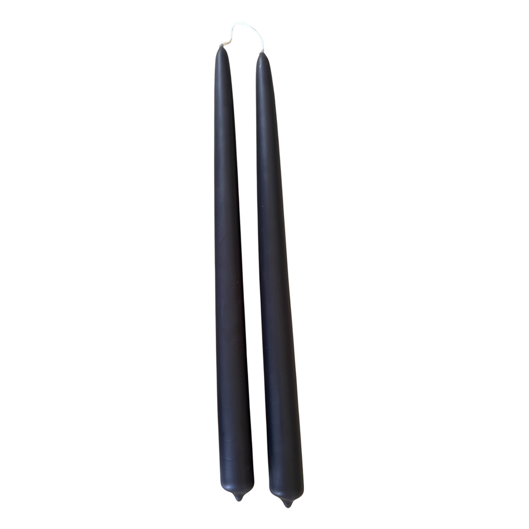 A pair of purple-grey color, elegant, hand-dipped beeswax taper candles made with natural plant-based pigments for an eco-friendly, non -drip, elevated home decor accent.