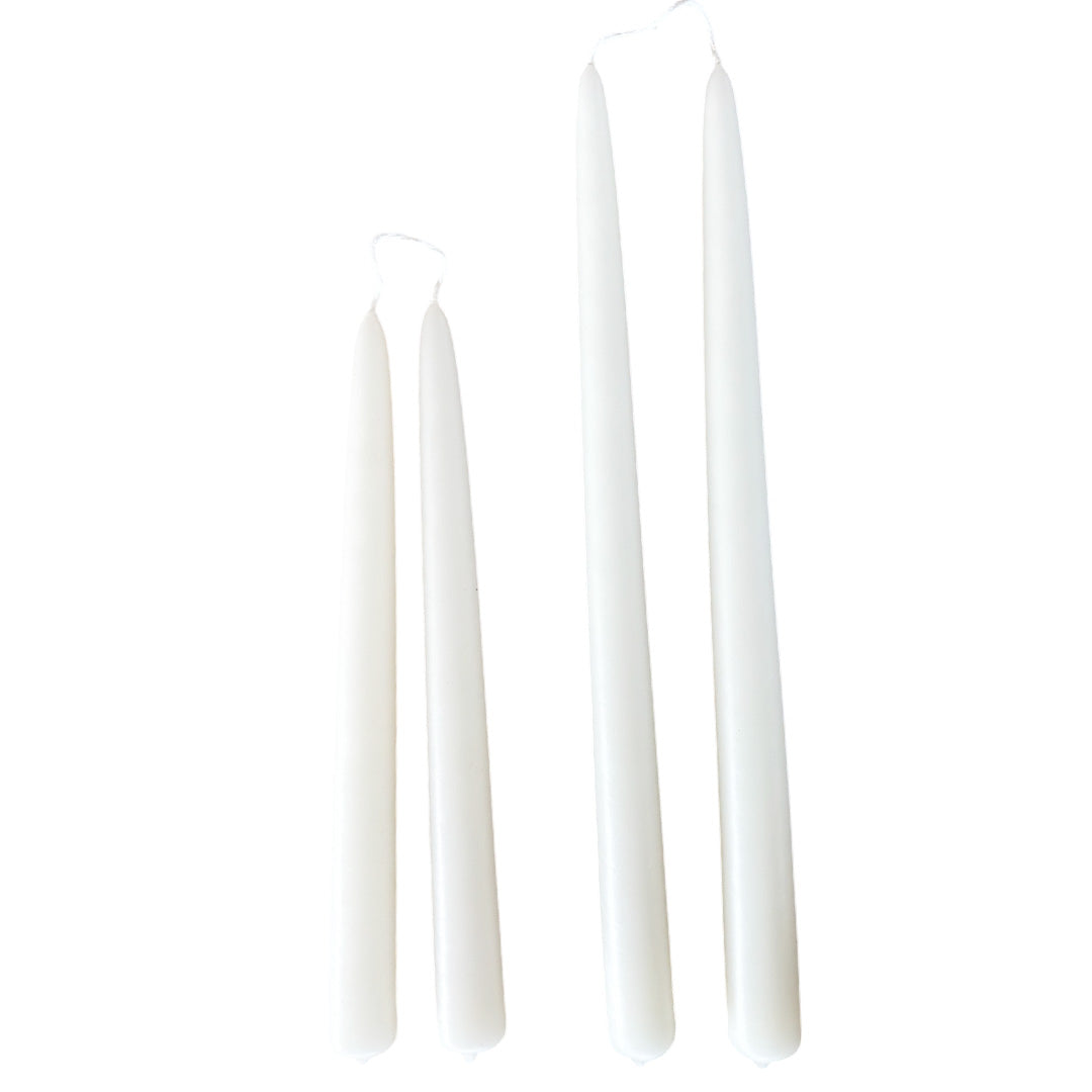Hand-dipped beeswax taper candles in Alpine Glow, crafted with plant-based pigments for a luxurious look