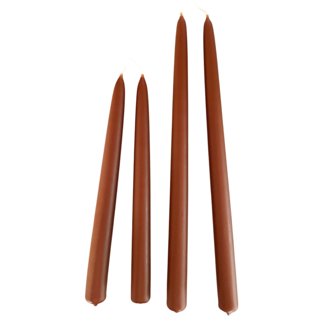 hand-dipped beeswax taper candles in Bedouin, crafted with plant-based pigments for a luxurious look.