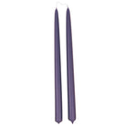 A pair of Maritime Blue 12-inch hand-dipped beeswax taper candles in deep bluish purple, GLŌAM.