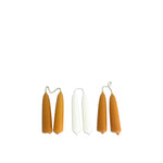 Dripless, beeswax hand-dipped mini taper candles in a trio of Toffee- ochre, caramel and white.  Dripless.  5 hours burn with a beautiful warm flame. brings warmth and elevates any home  or office interiors.