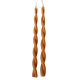 A pair of GLŌAM hand-twisted beeswax candles in Ochre, a clean white hue, crafted with plant-based pigments. Best for unique  home accent,  elevate dinner parties, cozy and intimate environment.