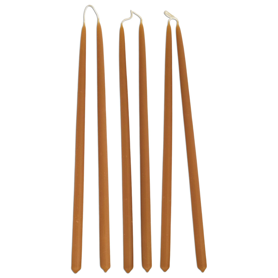 Three pairs of Ochre — Mustard 12-inch thin beeswax taper candles, six candles connected by their wicks and arranged on a white background.