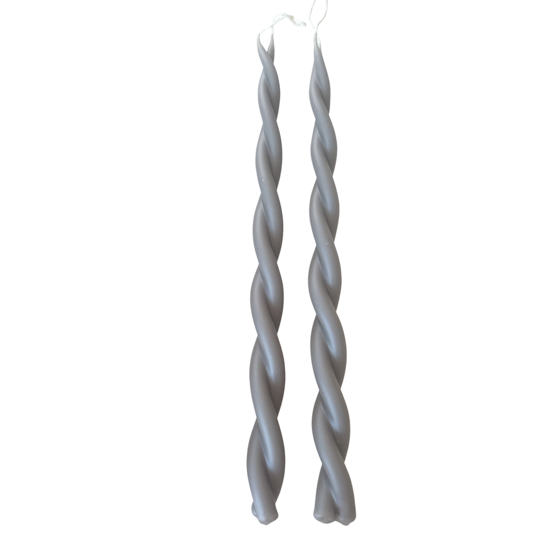 A pair of twisted pure beeswax taper candles plant-based pigments in Fauna-grey color, hand crafted for a luxurious look