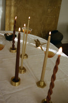 GLŌAM spike golden brass candlesticks layering with  spike holder, a versatile taper candle holder that fits Classic, Twisted, and stubby candles, solid polished brass.