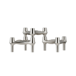 STOFF Nagel BMF candle holders in brushed chrome, three faceted modular holders with continuous flowing lines and a soft satin finish